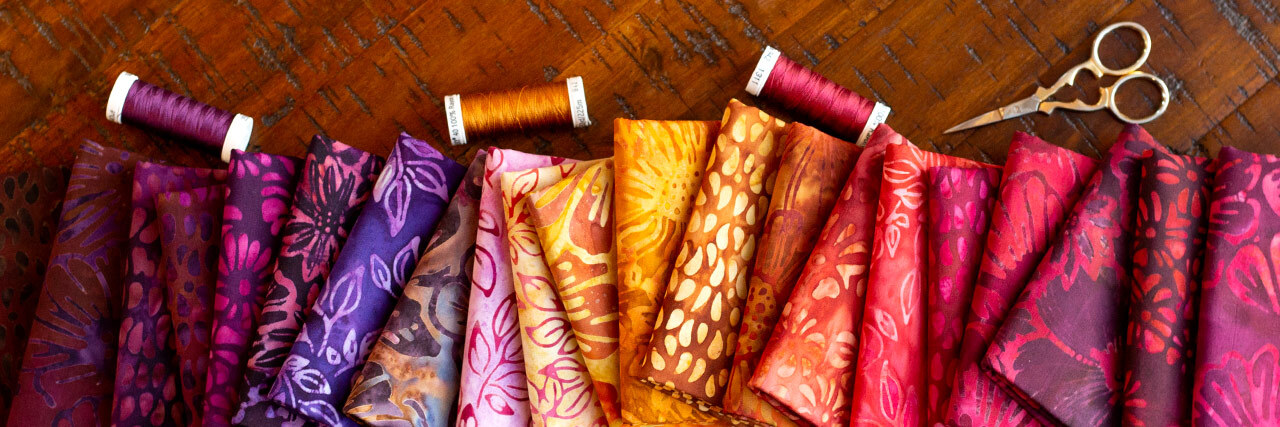 header image for Sunrise Blossoms Artisan Batiks