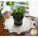 Welcome Home Scalloped Table Topper with a potted plant displayed on top