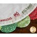 Close up of the hand embroidery on the Home for Christmas Scalloped Table Topper