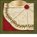 Cream-colored tree skirt with holly border made from jumbo ric-rac, applique leaves, and buttons.