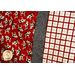 A close up of the adorable cows and accent stripe in the Animal Crackers Magic Pillowcase