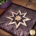Close up of the lovely star piecing design in the Folded Star Squared Hot Pads