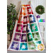 Joyful Stars Quilt draped over a ladder