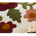 Hand embroidery details on the In Full Bloom - Wool Mat