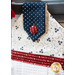 Red fabric covered button against the blue patriotic fabric in the American Gathering Hanging Towel