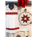 The coordinating Hanging Towel and Folded Star Hot Pad made with American Gathering fabrics