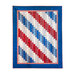 Red, white, and blue patriotic quilt on a white background