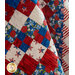 The America the Beautiful - Trip Around The World Quilt draped
