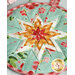 The red, orange, and white center star on the Strawberry Honey Folded Star Hot Pad