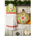 The coordinating green Strawberry Honey hot pad and hanging towel