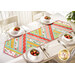 The brightly colored Greased Lightning Table Runner made with Strawberry Honey fabrics