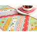 Colorful Strawberry Honey fabrics and zig zag piecing on the Greased Lightning Table Runner
