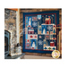 A styled image of the finished Winter Solstice quilt displayed near a fireplace | Shabby Fabrics