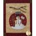 Block 12 of the Winter Wonderland Laser Cut quilt featuring an ornament with a snowman on it