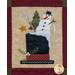 Block 6 of the Winter Wonderland Laser Cut quilt showing a melting snowman on a hat