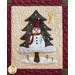 Block 8 of the Winter Wonderland Wool Quilt featuring a Christmas tree with a snowman on it