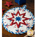 The center star design of the America the Beautiful Folded Star Hot Pad