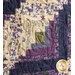 A close up of the log cabin blocks in the Log Cabin Throw Quilt - Violet Hill