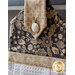 A close up of the beautiful fabric covered button used in the Maryland Hanging Towel