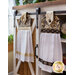 The two coordinating Maryland Hanging Towels hung from a cabinet