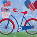 Patriotic colored bicycle with a flag and baloons.