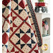 The beautiful Patriotic Star Quilt draped over a bookcase