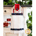 A beautiful patriotic themed hanging towel hung from a cabinet