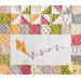 Quilt block with a laser cut kite and embroidered accents