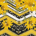 Bumblebees, yellow flowers, and zig zagged honeycomb stripes