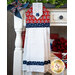 A patriotic red, white, and blue hanging towel hung from a cabinet
