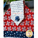 A close up of the red pinwheel fabric used in the Land of Liberty Hanging Towel
