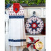 The coordinating white hanging towel and folded star hot pad made with Land of Liberty fabrics