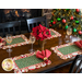 A set table with four Postcard Holiday Scalloped Placemats and coordinating cloth napkins