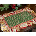 The center holly fabric used in the Postcard Holiday Scalloped Placemats