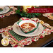 The coordinating Postcard Holiday Bowl Cozy and Scalloped Placemats