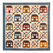 A colorful quilt with house blocks and checkered lattice designs