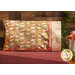 Pillow covered by a floral print and green background pillowcase