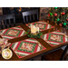 Holiday themed placemats arranged on table with matching napkins