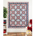 Red white and blue quilt with checkered patterns.