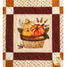 Quilt block featuring pumpkins and florals.
