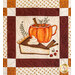 Quilt block featuring a pumpkin and pie.