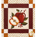Quilt block featuring an apple.