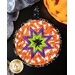 Round hot pad with central folded star design featuring Halloween themed fabrics.