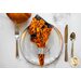 Orange and black Halloween themed cloth napkin.