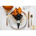 Orange and black Halloween themed cloth napkin.