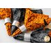 Orange and black Halloween themed cloth napkins.