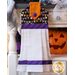 Hanging towel with Halloween colors, pennant imagery and white waffle texture.