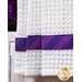 White waffle textured towel with purple stripe band.
