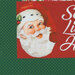 close up of the Peppermint Candy apron panel, showcasing the smiling Santa face