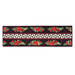 Christmas themed table runner featuring florals with white and black pinwheel center strip design.